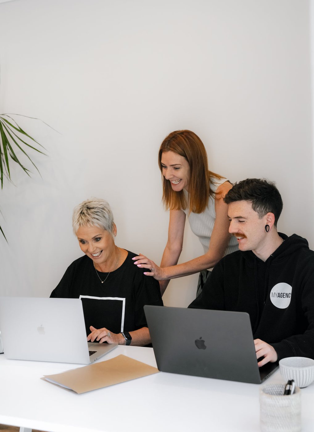 The MyAgency team working together